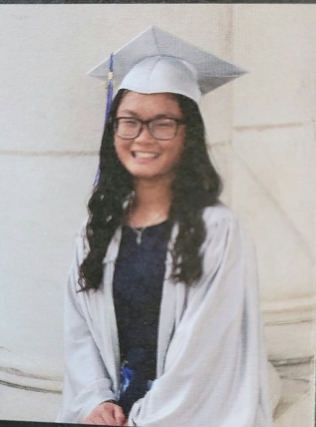 Monica Ballard in graduation cap and gown